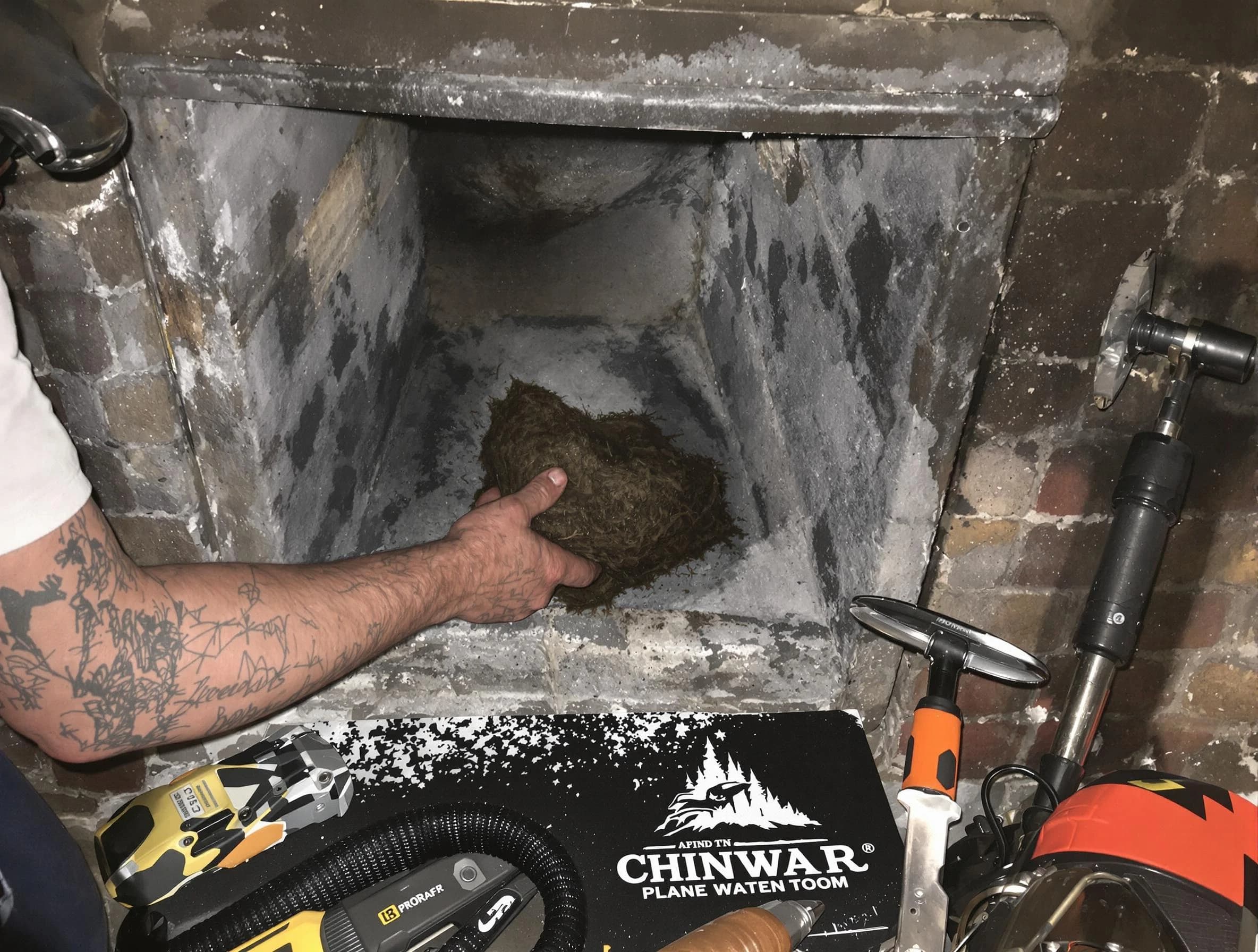 Midwest City Chimney Sweep safely removing debris and screening chimney in Midwest City, OK